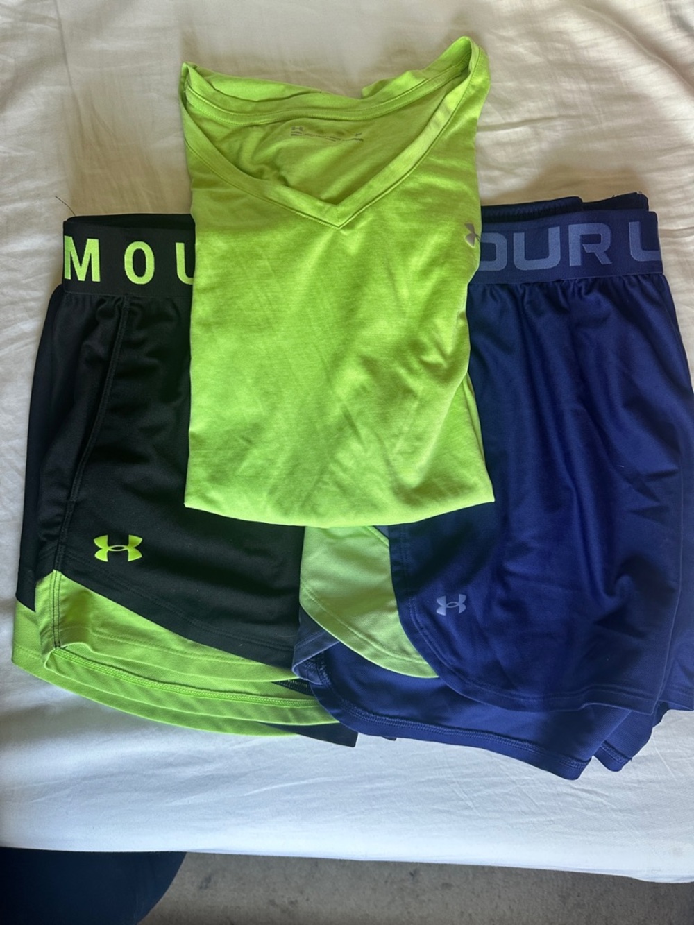 Women’s Under Armour V-Neck Tee with 2 pairs of Under Armour Athletic Shorts